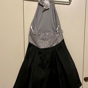 Strapless short, knee high, black with metallic silver.